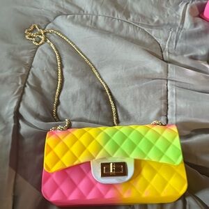 colorful pink green and yellow purse.